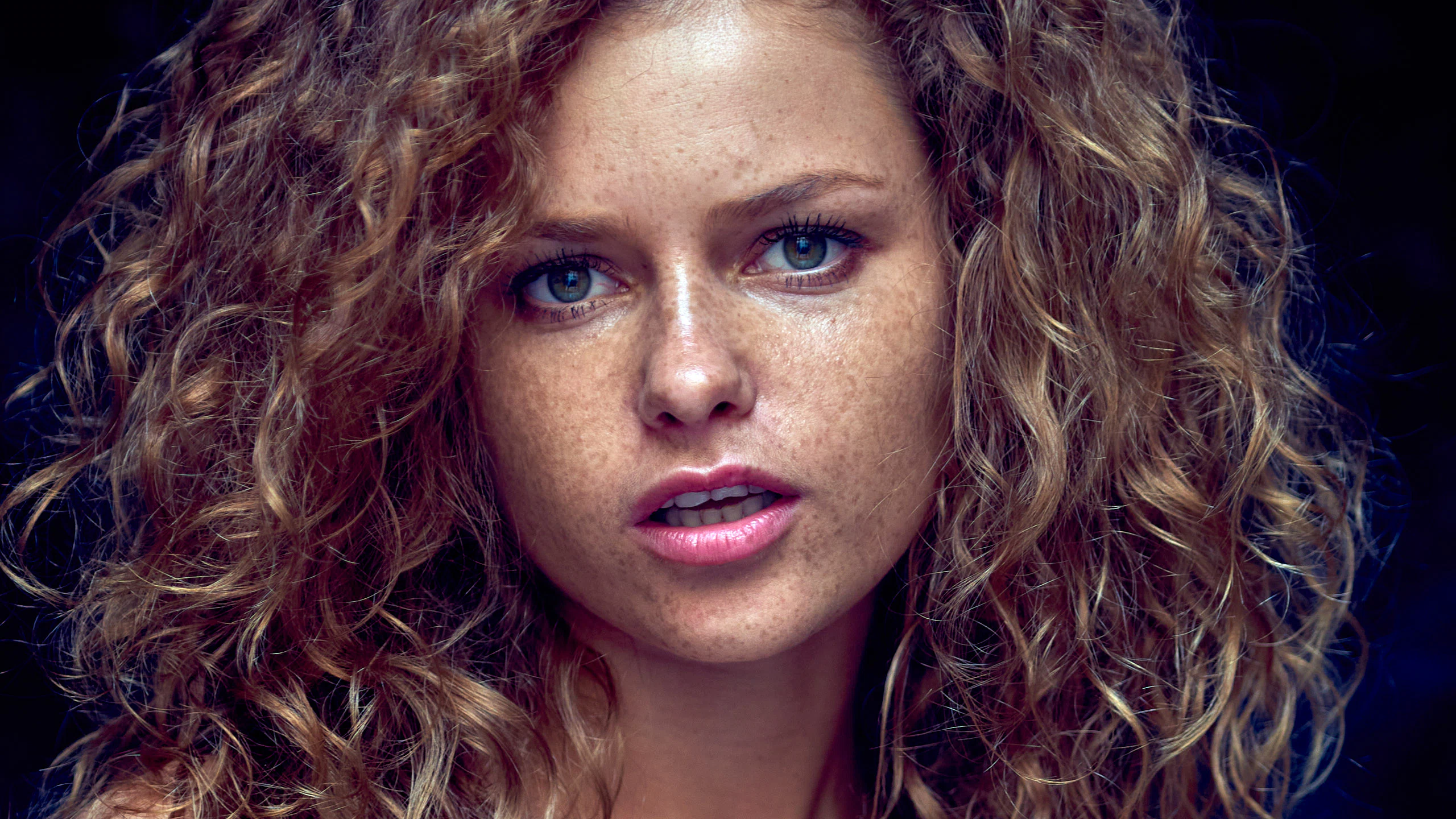Expressive portrait photograph of red-haired Julia Yaroshenko