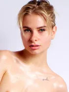 Ksenia in the Delicate nude art series with a calm and fragile expression